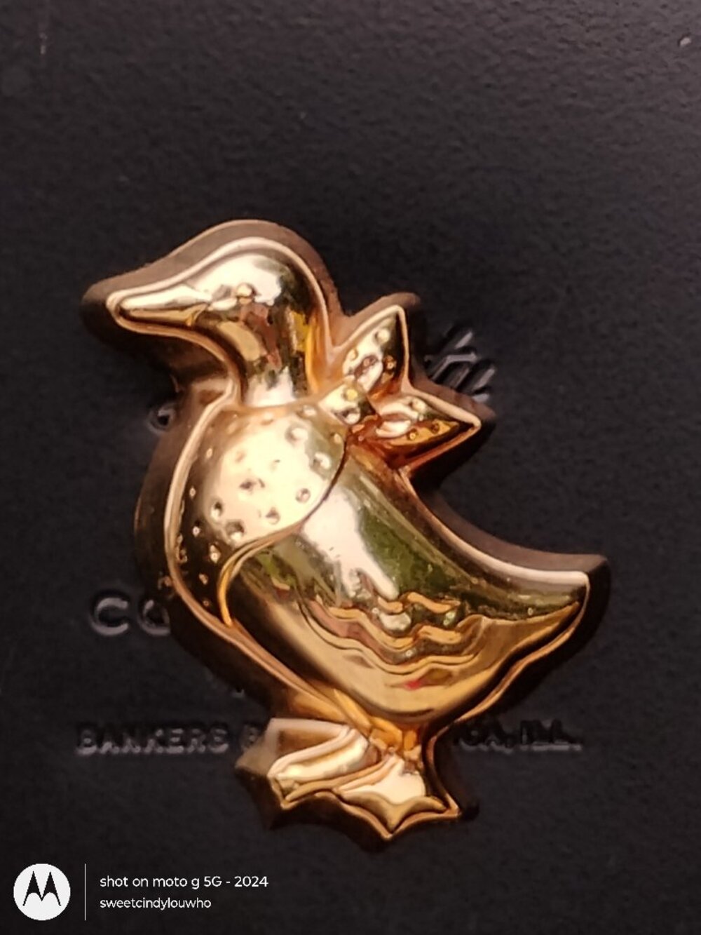 copper colored goose with polka dot scarf fridge magnet like mini jello mold